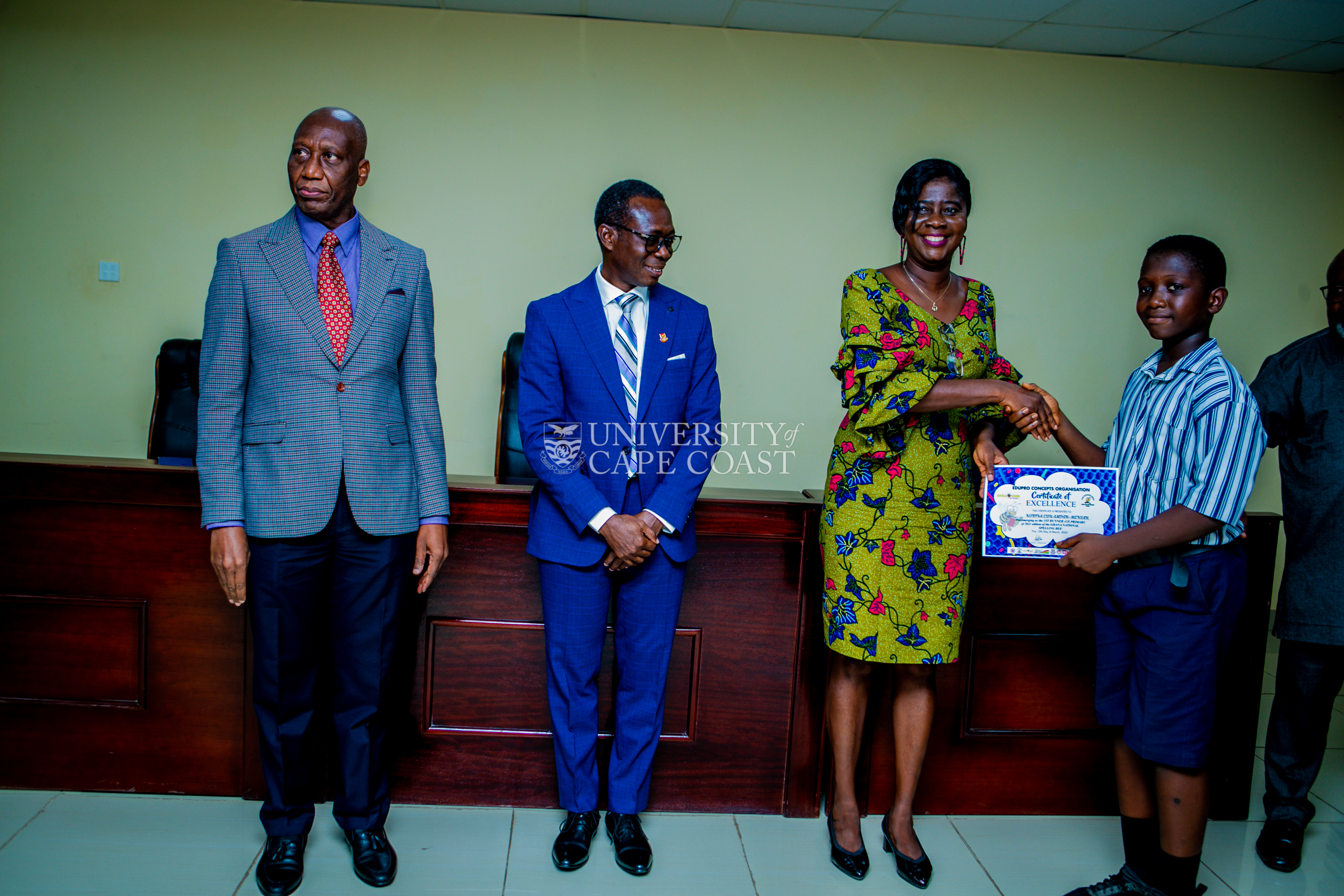 An award winner in a handshake with Pro VC-UCC, Prof. Rosemond Boohene. Looking on are the Vice-Chancellor (middle) and Registrar, Mr.Jeff Onyame (left) An award winner in a handshake with Pro VC-UCC, Prof. Rosemond Boohene. Looking on are the Vice-Chancellor (middle) and Registrar, Mr.Jeff Onyame (left)