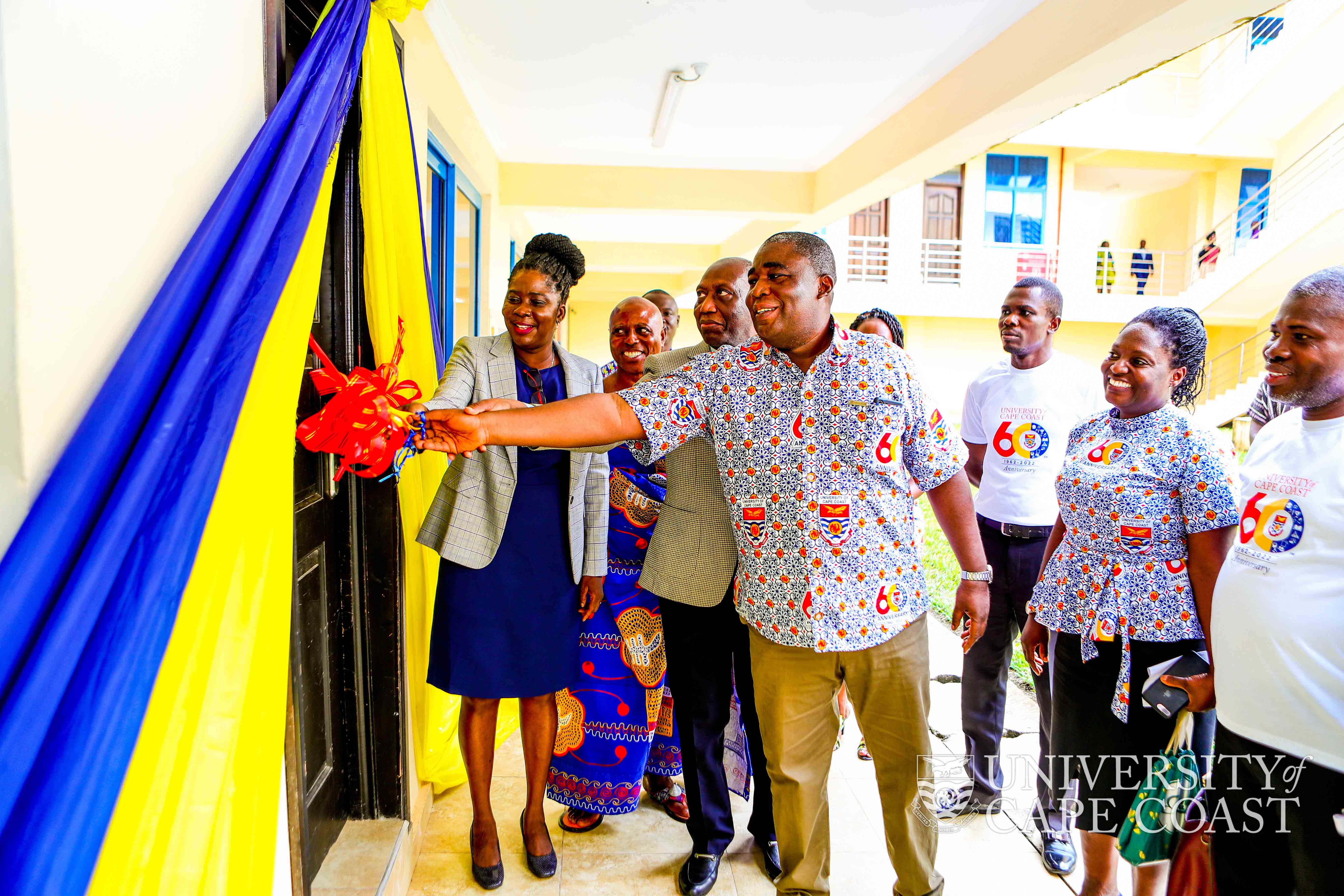 Pro VC being supported by the Registrar, Mr. Jeff Teye Onyame and the Librarian, Dr. Cobblah (in UCC@60 fabric) to inaugurate the facility Pro VC being supported by the Registrar, Mr. Jeff Teye Onyame and the Librarian, Dr. Cobblah (in UCC@60 fabric) to inaugurate the facility