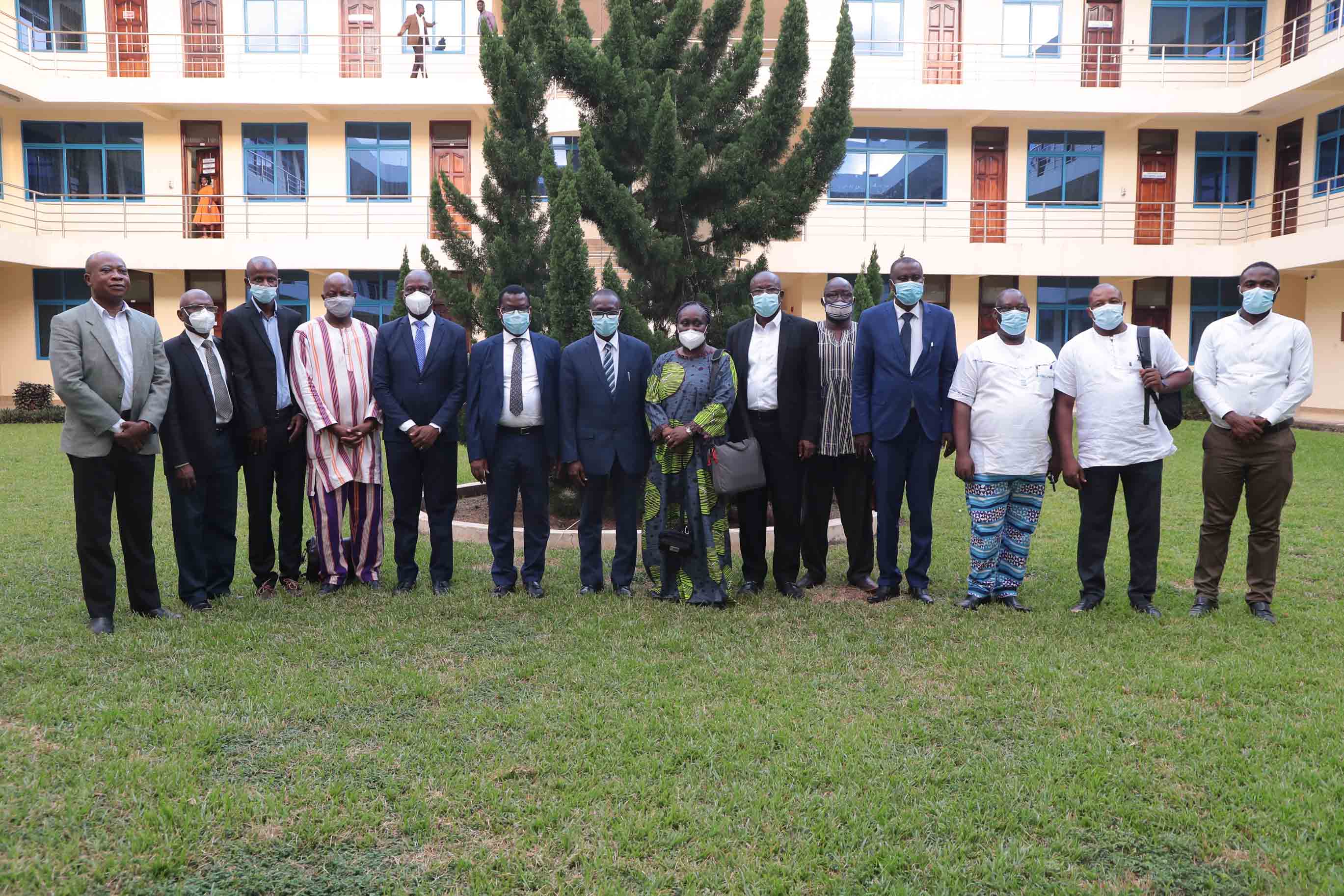 Representatives of WASCAL in a group photo with the Vice-Chancellor and Registrar.