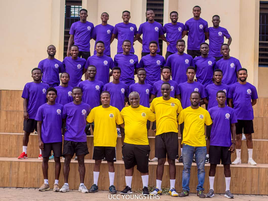 Officials with players in the branded t-shirts