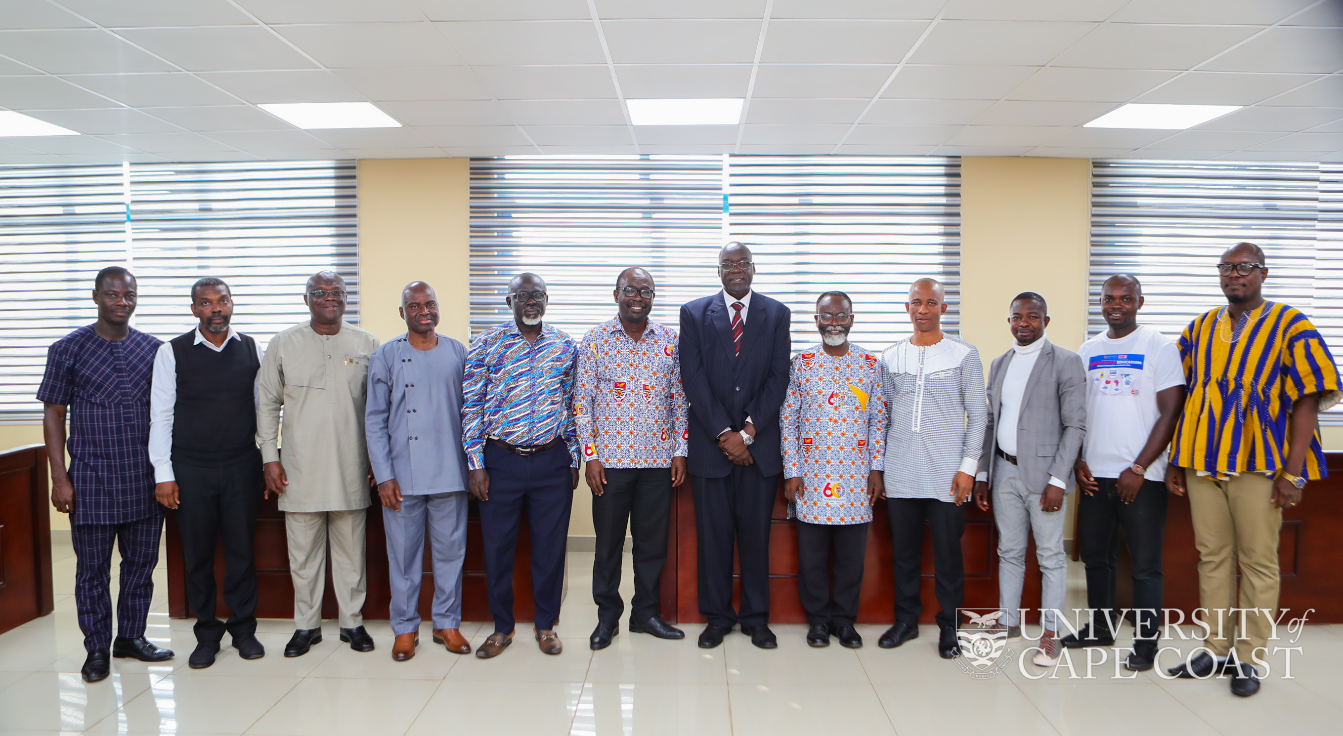 The RUFORUM Executive Secretary (in suit) with some senior members of UCC