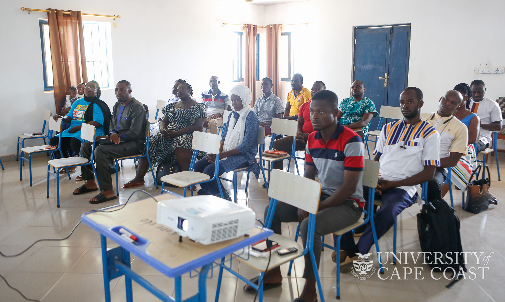 Students listening to the presentations