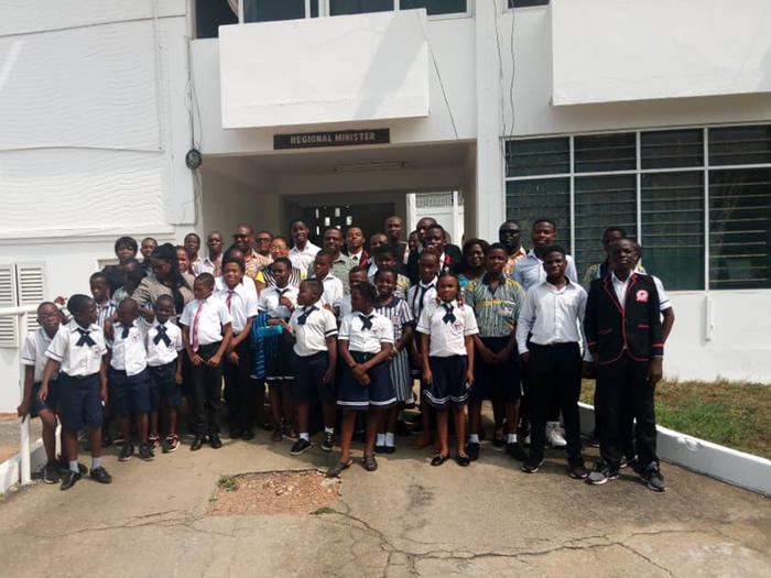 The exchange pupils and headteachers of the University Basic Schools with the Central Regional Minister, Mr. Kwamina Duncan