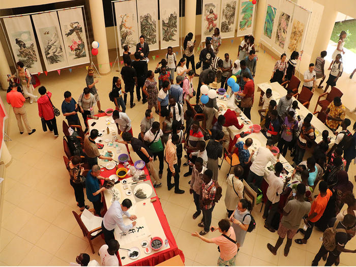 Some of the Chinese artistes painting at their at the programme Some of the Chinese artistes painting at their at the programme