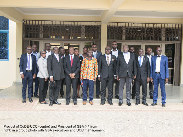 Provost of CoDE-UCC (centre) and President of GBA (4th from right) in a group photo with GBA executives and UCC management
