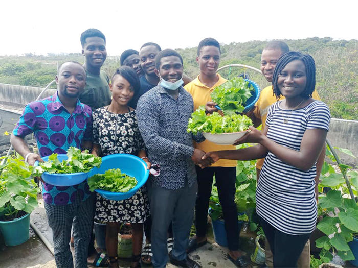 Students displaying their harvest Students displaying their harvest