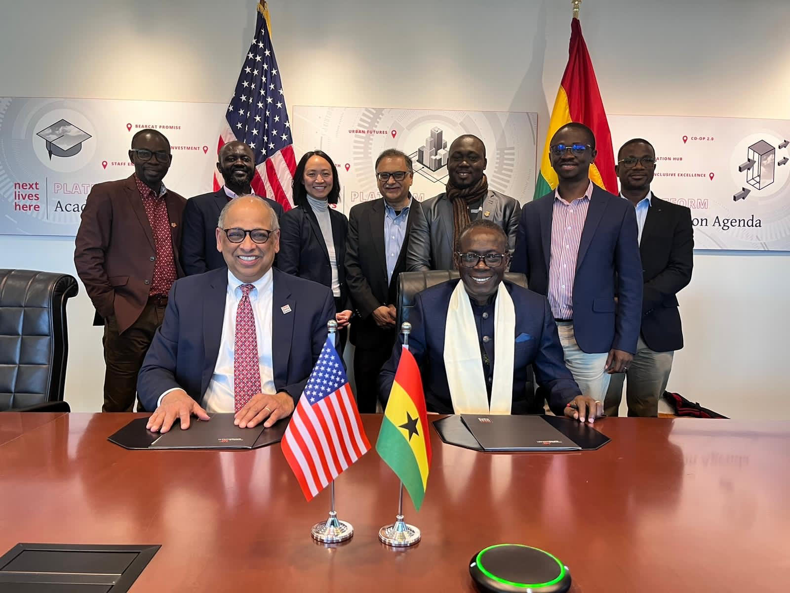 A group shot of members present at the signing ceremony 