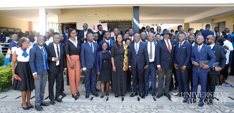 Some students of the Faculty of Law-UCC in a photo with dignitaries who graced the confab