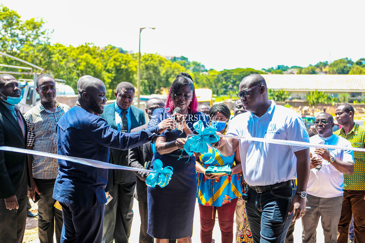 Pro VC, Prof. Rosemond Boohene cutting the tape to inaugurate the lube bay. She was assisted by MD, VAC, Mr. Fred Sarkah (right)